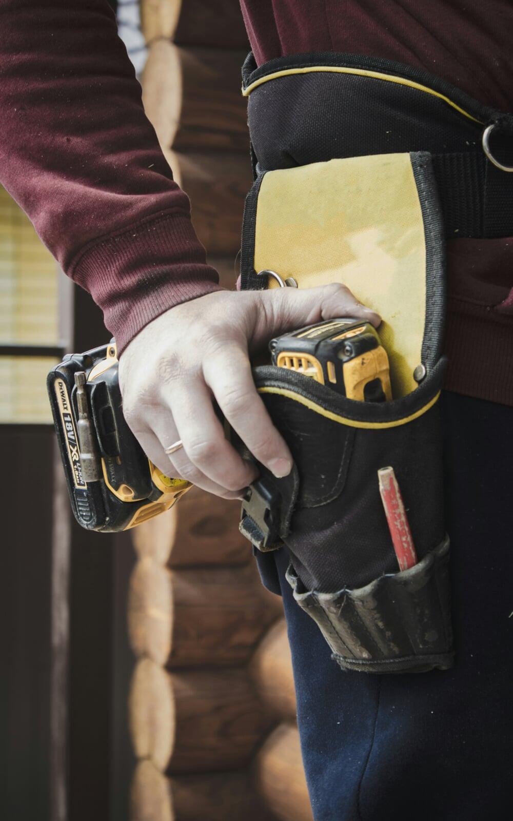 Man holding toolbelt